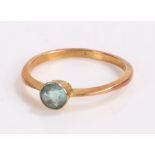 Gold coloured metal ring set with an aquamarine, ring size N 1/2, 1.4g