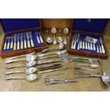 Collection of fish knives and forks, housed in a mahogany canteen box with another canteen box