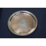 Hugh Wallace of Cheshire copper and pewter dish, the beaten central field with pewter snowdrops,