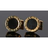 Pair of Bvlgari cufflinks, with onyx heads to gilt metal