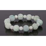 Jade bracelet, with carved pale green beads and white beads