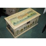 Painted pine blanket box, decorated with a church and trees, 82cm wide