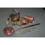 Brass coal scuttle, copper warming pan with turned wooden handle, brass footman, copper and brass