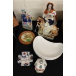 Three Staffordshire figures, Red Riding Hood, Empress and another depicting two musicians,