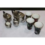 Crown Devon ware silverine porcelain teapots, together with four Winton Beauvais porcelain cups,