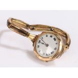 9 carat gold ladies wristwatch, the white dial with Roman numerals, crown wound, the case 25.5mm