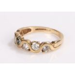 9 carat gold ring, the wavy band set with five pieces of clear paste, ring size J, 2.1g
