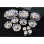 19th Century porcelain part tea set, with large cups and saucers, plates and egg cups, the bases