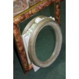 Oval wall mirror in a silvered frame, wall mirror with foliate pediment, wall mirror in a foliate