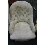 Victorian button back bedroom chair, with butterfly and foliate upholstery, raised on turned legs