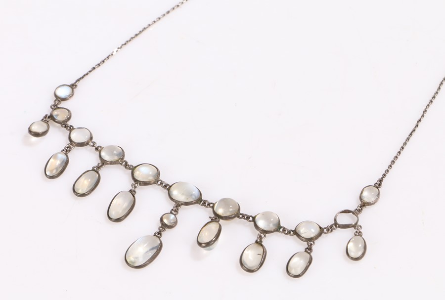 Sterling silver and moonstone necklace, with circular and oval moonstones (one stone missing)