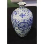 Royal Bonn Germany Lyonais pattern blue and white vase, the slender quatrefoil neck above a