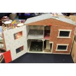 Wooden dolls house with brick effect and carpets, 56cm wide