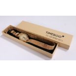 Timeboo bamboo wristwatch, the signed dial with baton markers, on a long cork bracelet, the case