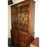George III style mahogany bookcase cabinet, with astragal glazed doors above the cupboard, 115cm