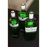 Three bottles of Gordon's Gin, two at 1 litre and one 70cl, (3)