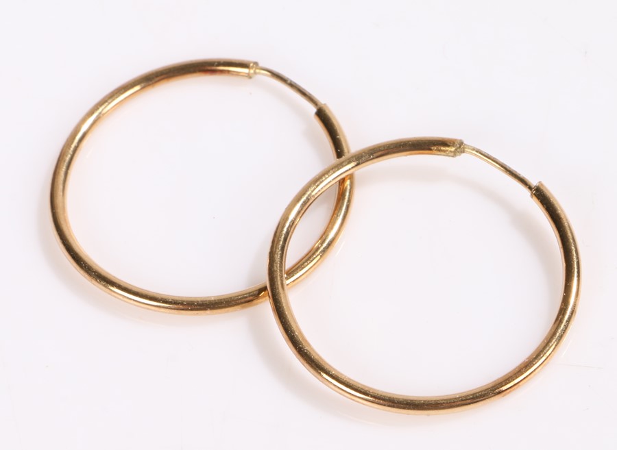 Pair of 9 carat gold hoop earrings, 2.2g
