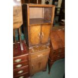 Herbert E. Gibbs oak veneered bedside cabinet, with open recess above two cupboard doors, 37cm wide,