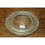 Silver plated framed wall mirror, with leaf decoration, 25.5cm diameter
