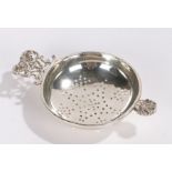 George VI silver tea strainer, London 1950, maker William Comyns & Sons Ltd. the circular pierced