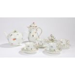 Early 20th Century Meissen part tea service, decorated with sprays of flowers on a white ground,