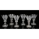 Matched set of six 19th Century glasses, each with cut bowls above stems and a square base, 9.5cm