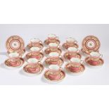 Twelve piece porcelain coffee service, with twelve coffee cans with pink edges and gilt foliate