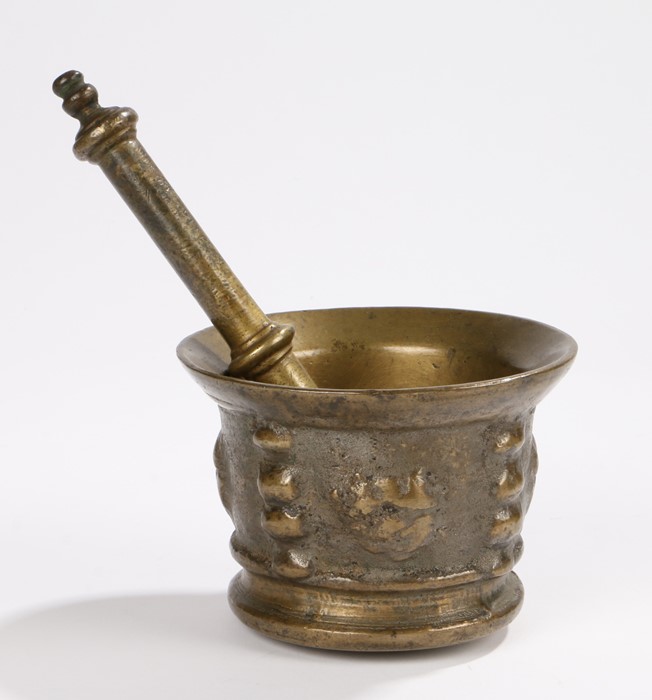 17th Century bronze mortar and pestle, Spanish/Southern France, with a mask and ribbed tapering