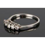 Diamond set ring, the head set with five round cut diamonds, ring size Q