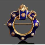 Victorian pearl and enamel brooch, with a wavy frame and buckle end, 32mm diameter