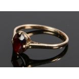 9 carat gold garnet ring, with an oval garnet, ring size R