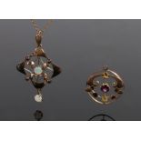 Two Art Nouveau pendants, to include a garnet set example and a an opal set example with chain,