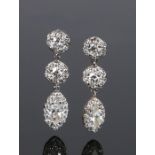 Pair of diamond set drops, the earrings with navette cut drops and diamond surround, 22mm long