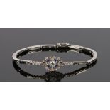 Sapphire and diamond set bracelet, with a central diamond and a surround consisting of further