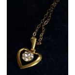 9 carat gold necklace with heart form clear paste set pendant, 0.7g