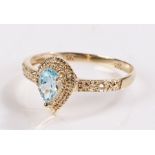 9 carat gold blue topaz and diamond ring, size N