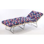 Kettler folding sun bed, with polychrome foliate decorated cushion and chrome folding frameWear /