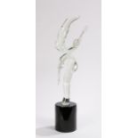 Sergio Rossi Murano glass figural group, in clear glass of a dancing couple above a signed black