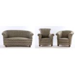Early 20th Century harlequin three piece suite, consisting of two seat settee and two armchairs,