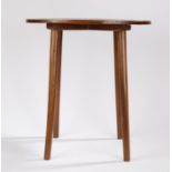 Mid 20th century teak occasional table, with oval top raised on four turned tapering legs, 51cm x