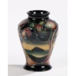 Moorcroft Western Isles pattern vase, the bulbous tapering body with tree decoration, incised and