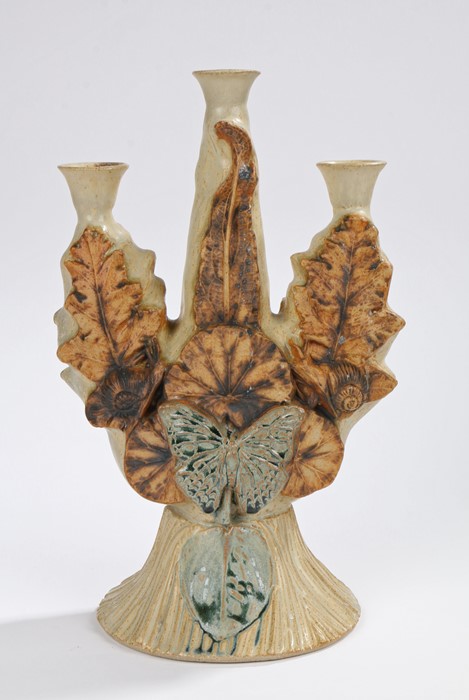 Bernard Rooke pottery three branch candelabra, the sconces above a central section with raised