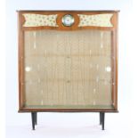 Mid 20th Century walnut veneered display cabinet, the frieze with inset Smiths 30 hour clock above