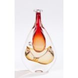 Karlin Rushbrooke art glass orange and clear glass vase, the slender neck above a teardrop shaped
