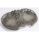 Art Nouveau pewter dish by Elsie Ward Hering (1872-1923), with central depiction of a female face