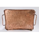Arts and Crafts style copper tray, the beaten central field with leaf decoration and folded rim,