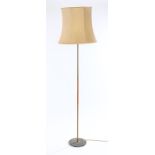 1970's standard lamp with brass and teak column, on a circular base, 154.5cm highScratches and