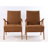 Pair of 1970's armchairs, with animal print effect upholstery and oak veneered framesRips and