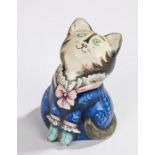 Joan and David De Bethel Rye pottery cat, depicted wearing a blue scroll decorated jacket with
