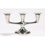 Silver plated three branch candelabra, of squat form, with detachable sconces, raised on a diamond